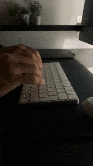 Someone typing on a keyboard